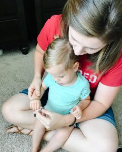 mom and daughter with bracelets