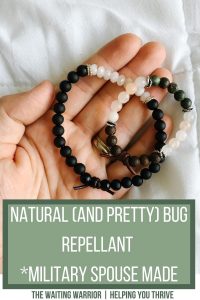Hand holding large and small essential oil diffuser bracelets