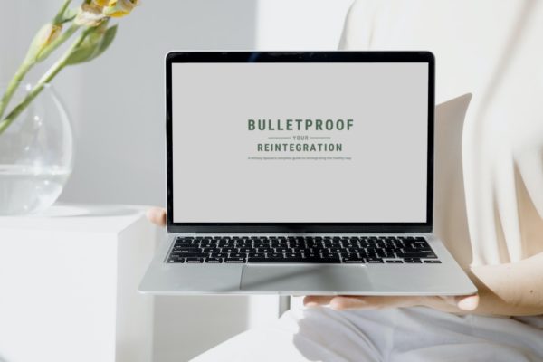 Bulletproof Your Reintegration: A military spouse's complete guide to a healthy reintegration. Shown on a computer screen with a plant in the background
