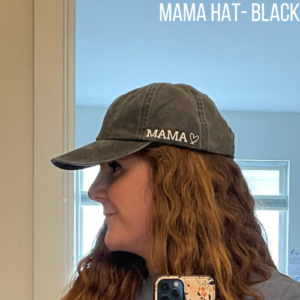 military spouse wearing black "mama" hat